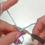 Place the working thread over the middle finger of the left hand and hold the loop with thumb and middle finger. Hook the thread with the crochet hook and...